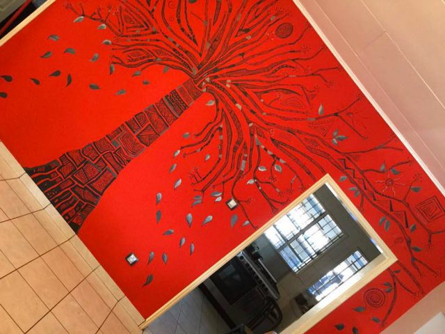Red tree on the wall